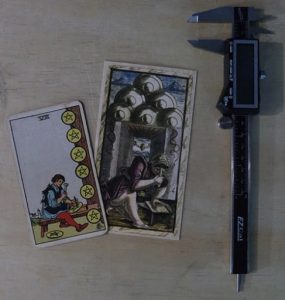 Sola Busca vs. Waite-Smith 8 of Pentacles