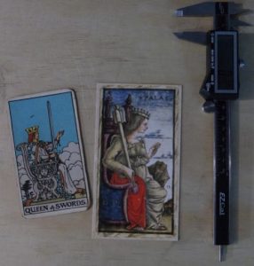 Sola Busca vs. Waite-Smith, Queen of Swords